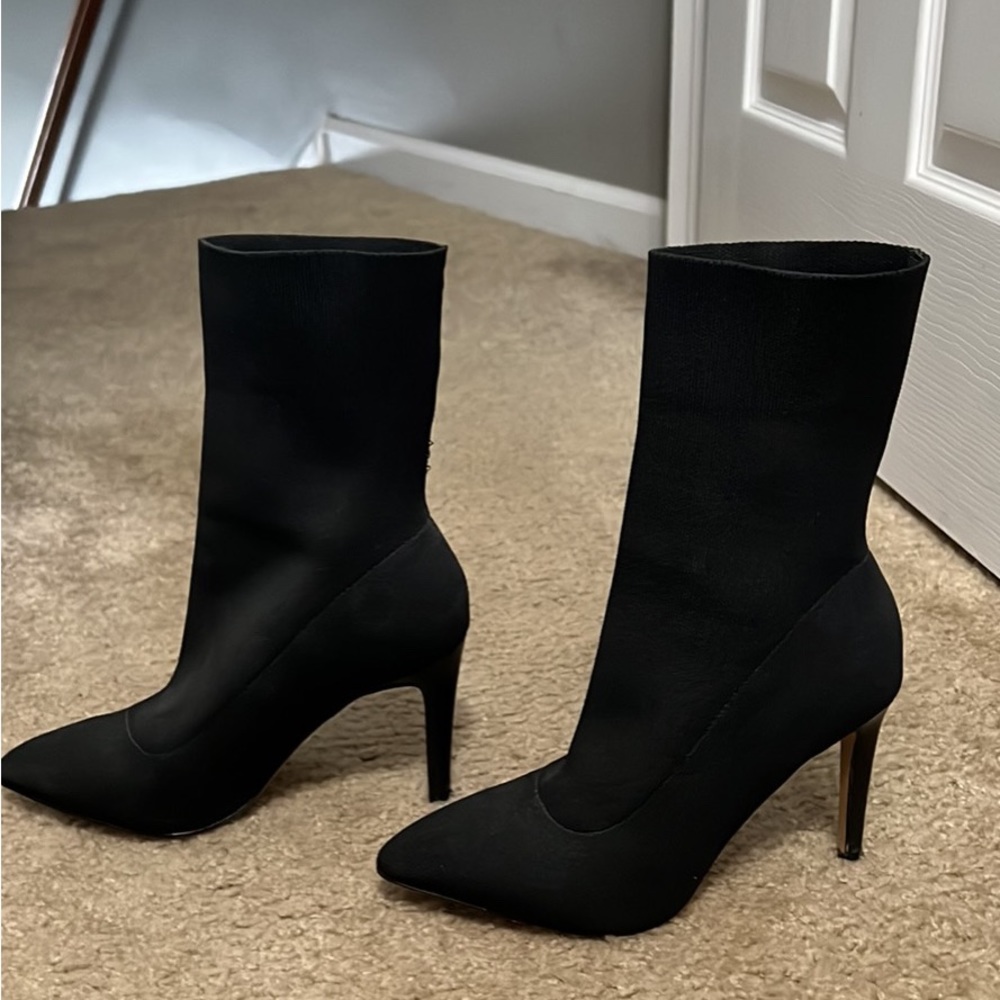 Stiletto black sock boots